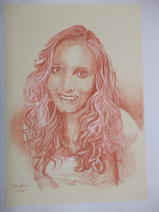 30/12/14 My Great niece. Sanguine and white pastel pencil on sand toned ingres pastel paper. 350 x 500mm 160gsm