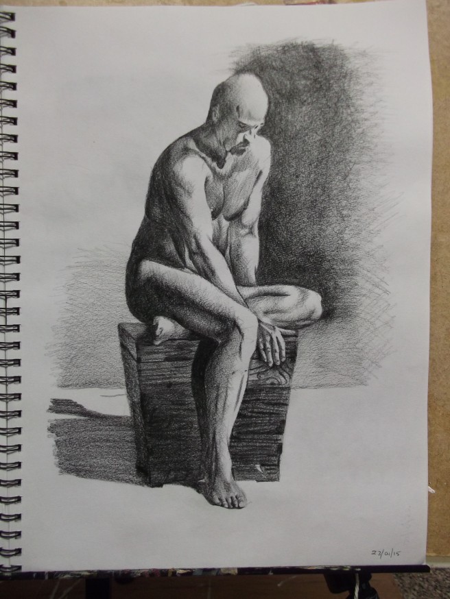 23/03/15 Male nude sitting on a box chest. Black Chalk in 16 x 12 inch sketchbook I